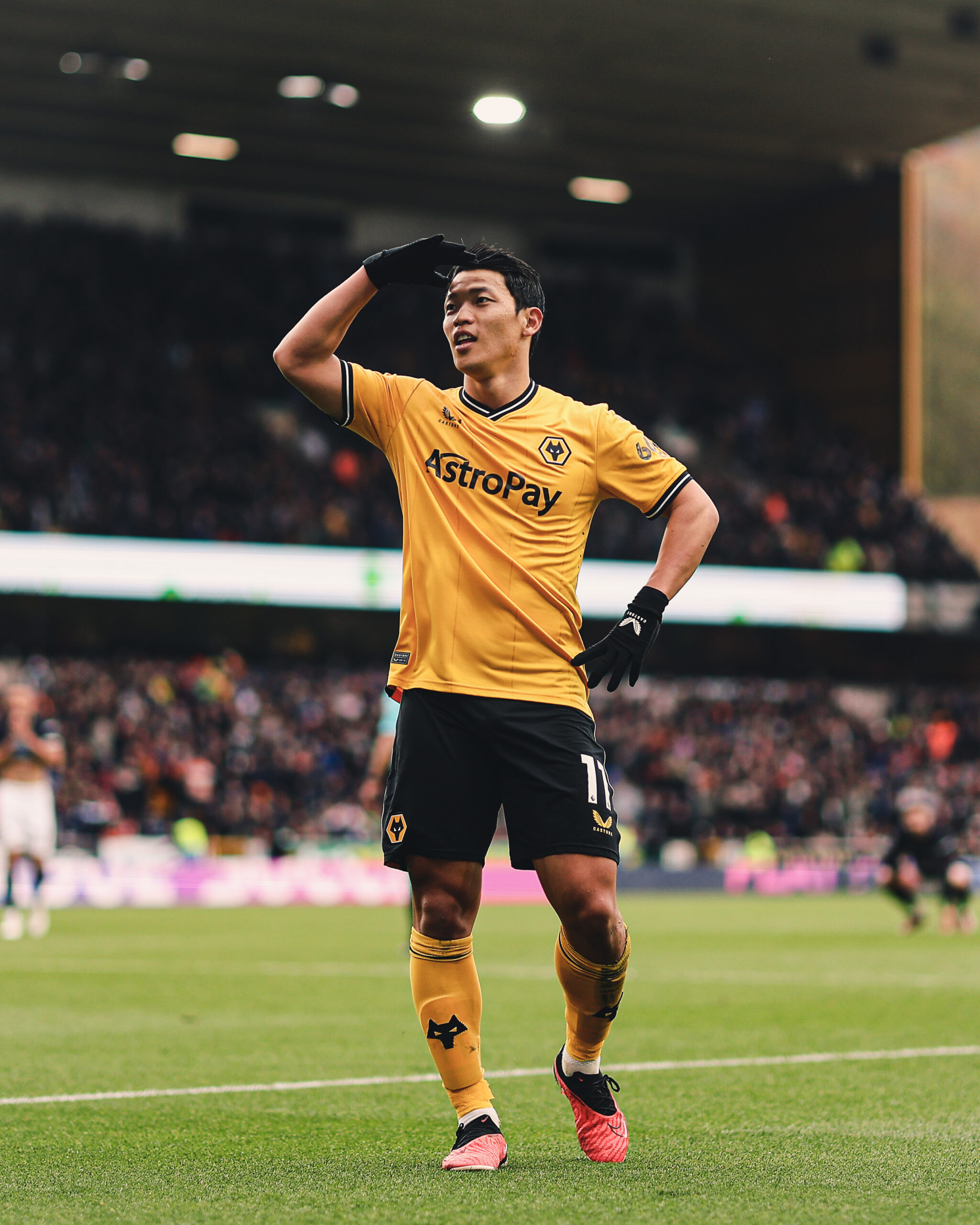 Hee Chan Hwang celebrates his goal with his trademark 'searching' celebration.