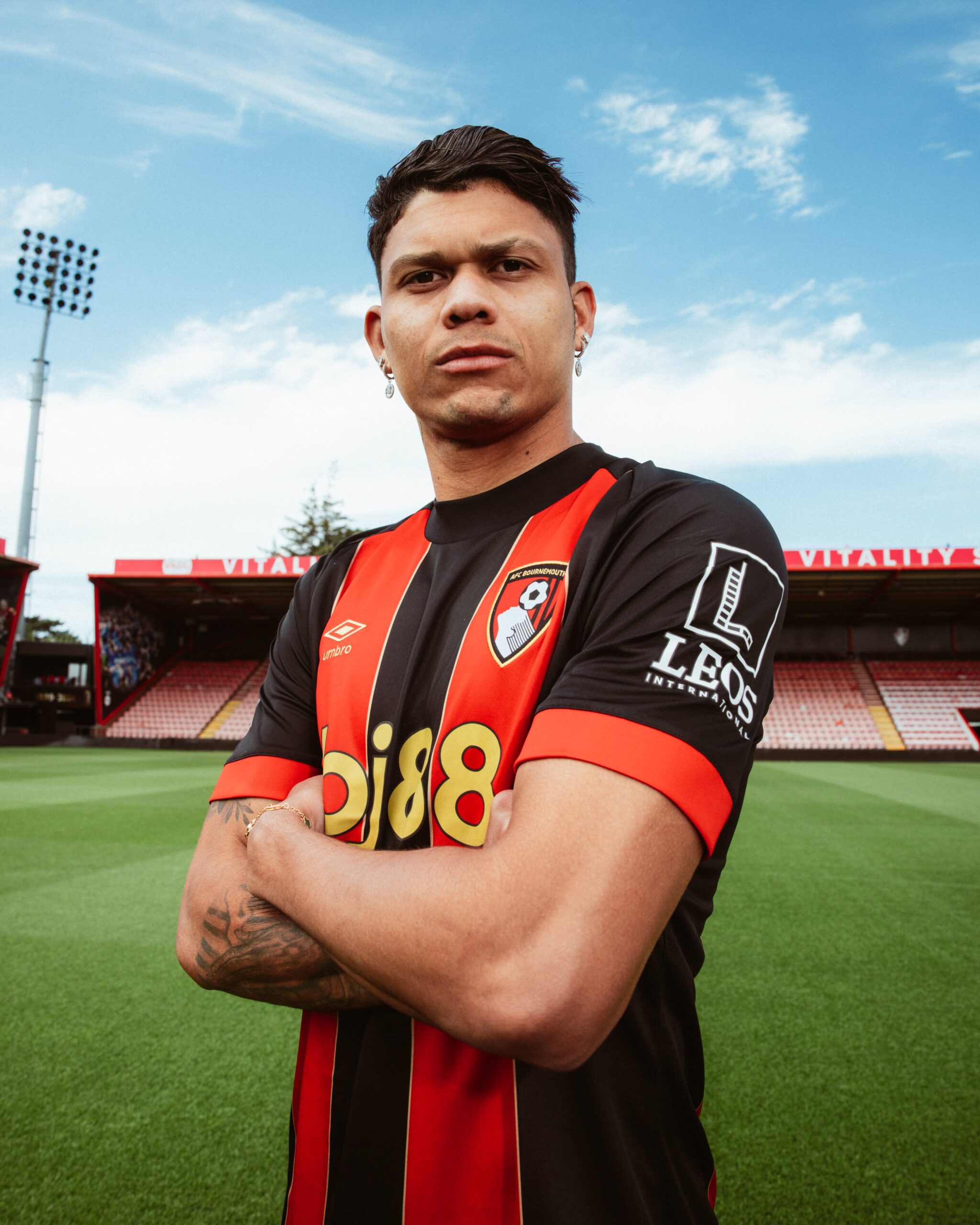 New signing Evanilson posing on the pitch at Vitality Stadium.